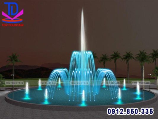 Đài phun nước hình tròn được lắp đặt trong công viên giúp tạo cảnh quan. 